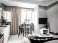 Smart och stilren inredning för compact living 25 kvadrat. Köksdel, matplats och vardagsrum i ett.