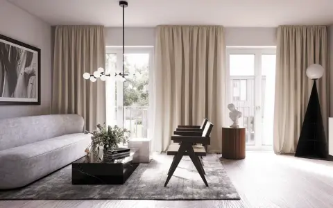 Ett elegant vardagsrum med skandinavisk inredning. En ljus soffa, marmorbord och en unik golvlampa skapar en stilfull atmosfär.