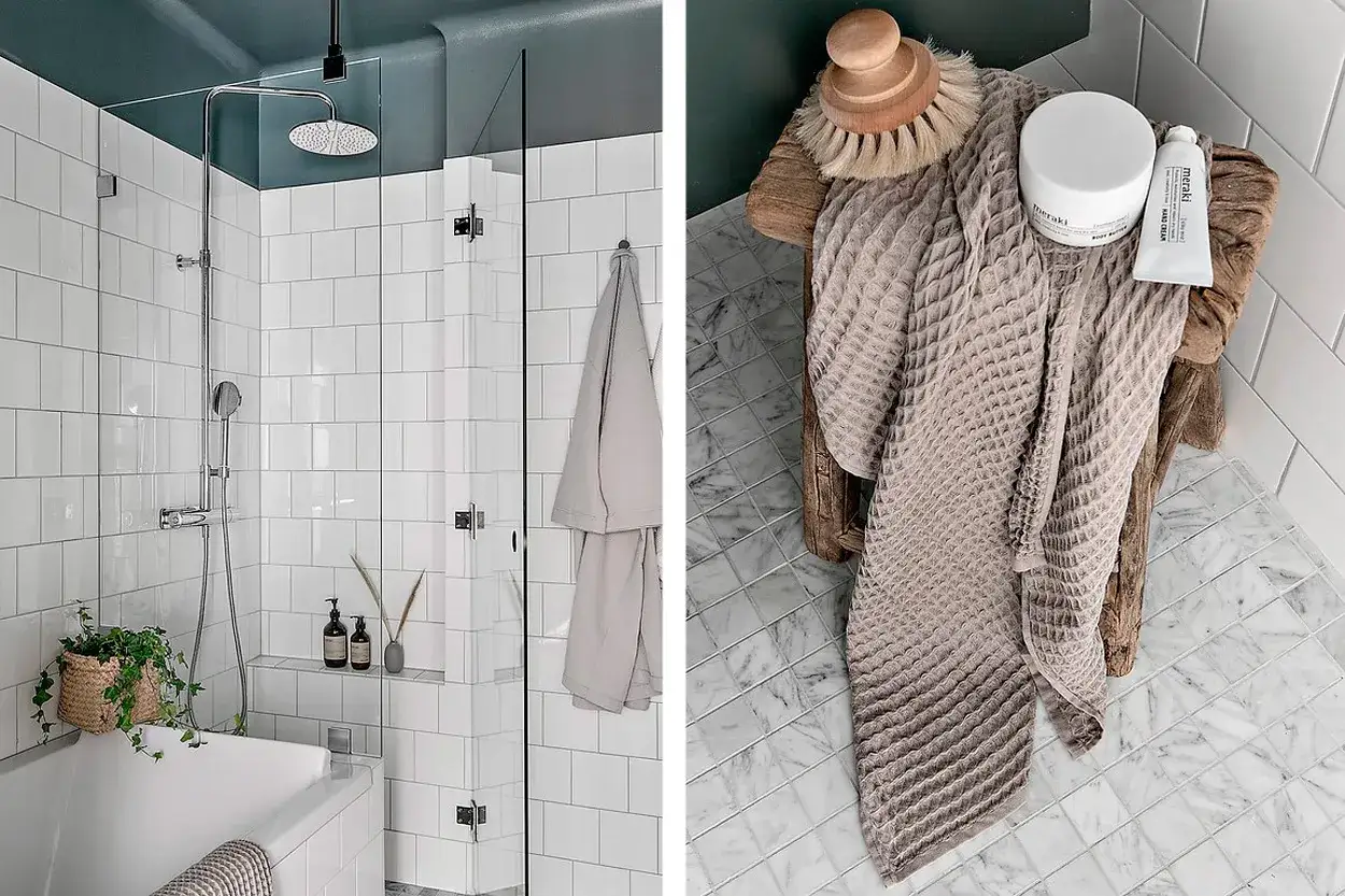 Små badrum inspiration: Vitt kakel, duschhörna med regndusch och en mysig handduk på en pall.